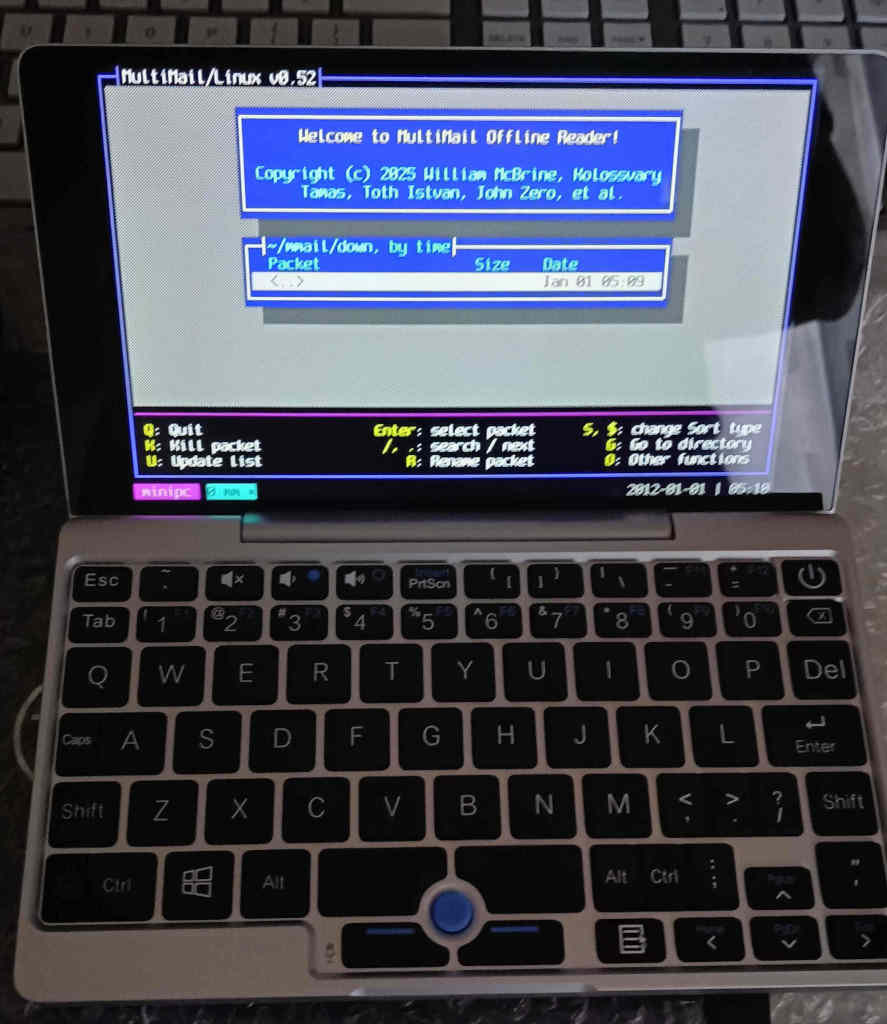 PursePC now running Alpine Linux with MultiMail and the fuchsia customization of tmux